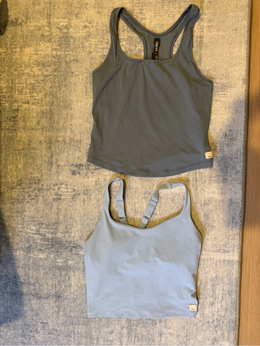 Vuori: Two Racerback Tank Tops in Slate Blue and Light Blue Worn Once